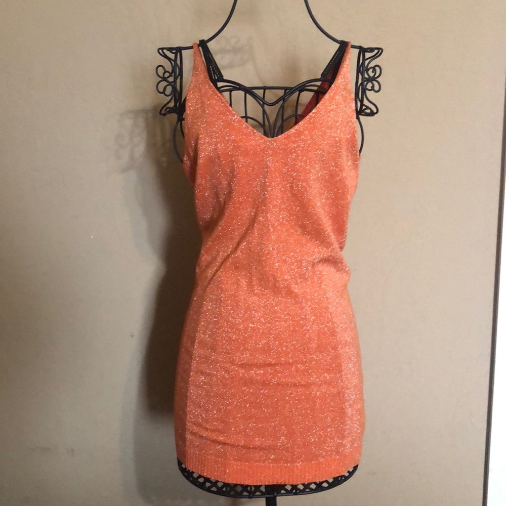 Orange shimmer tank top.